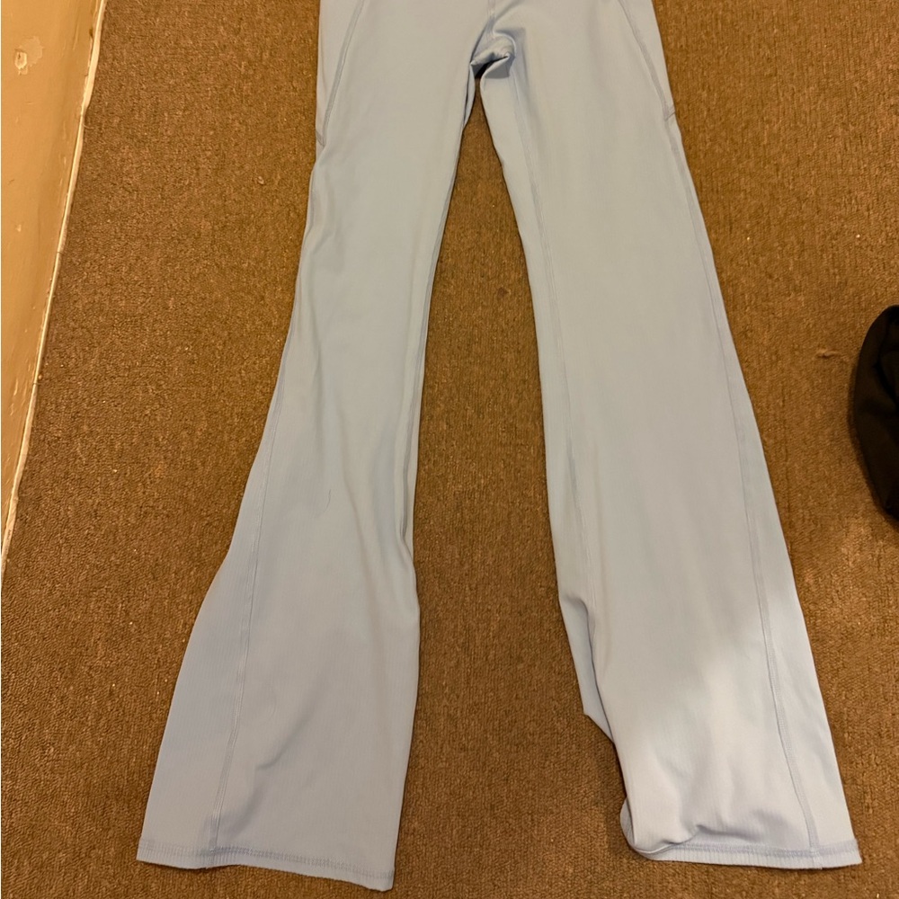 2 pairs of fabletics leggings size m flare